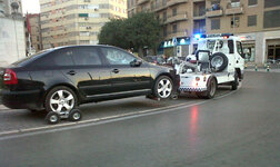 grua-cargando-coches.jpg
